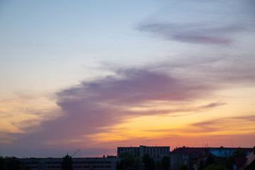 Fototapeta na wymiar orange clouds with blue sky on sunset. copy space