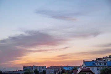 Fototapeta na wymiar orange clouds with blue sky on sunset. copy space