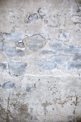 Damaged grey concrete wall exterior background texture