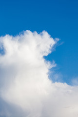 Big cloud on blue day sky