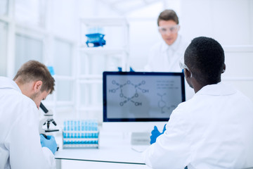 group of scientists working in the laboratory