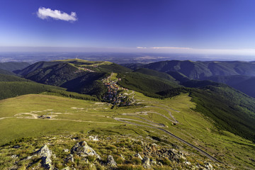Naklejka premium Aerial view of a resort on a mountain in summer day
