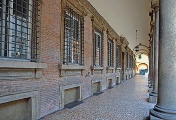 Fototapeta na wymiar Bologna, Italy, old portico in Santo Stefano street.