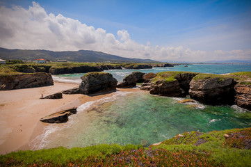 Fototapeta na wymiar Beauty Atlantic coast with cliff,beach,ocean and sky with clouds.