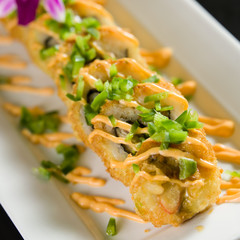 Sushi on a white plate