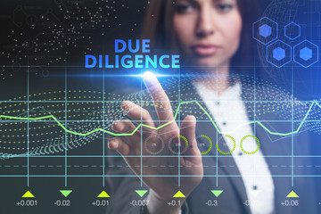 The concept of business, technology, the Internet and the network. A young entrepreneur working on a virtual screen of the future and sees the inscription: Due diligence