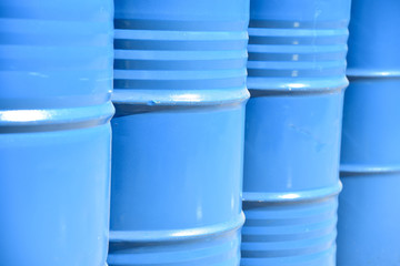 Blue Industrial Chemical Drums Background