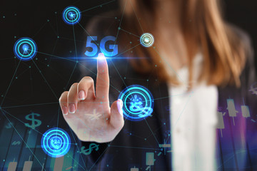 The concept of business, technology, the Internet and the network. A young entrepreneur working on a virtual screen of the future and sees the inscription: 5G