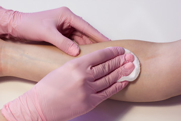 Close-up Of A Doctor Injecting Vaccine To Patient In Arm
