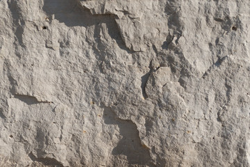 Background geology closeup limestone rock face showing weathered strata wallpaper