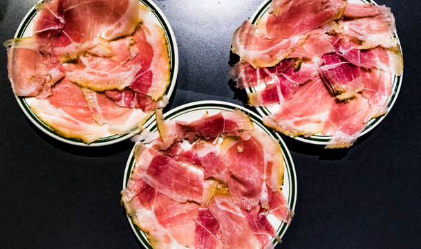 Cured southern ham served on plates in a restaurant