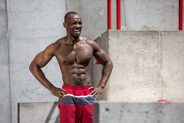 Athlete doing exercises at stadium