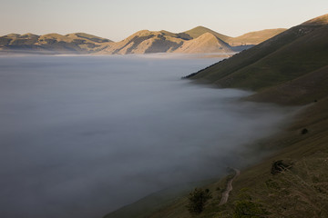 A magnificent sunrise in Castelluccio di Norcia. expecting more to the thousand colours of flowering
