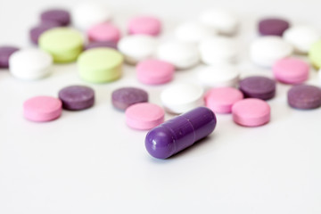 Obraz na płótnie Canvas Multicolored vitamin pills.