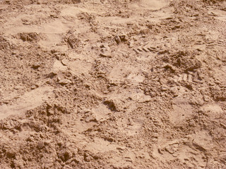 Spilled sand with close-up trails