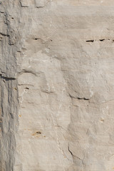 Background geology closeup limestone rock face showing weathered strata wallpaper