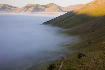 A magnificent sunrise in Castelluccio di Norcia. expecting more to the thousand colours of flowering
