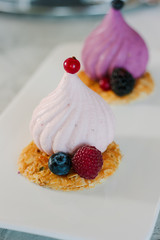 White soufle cake on white ceramic plate at restaurant.