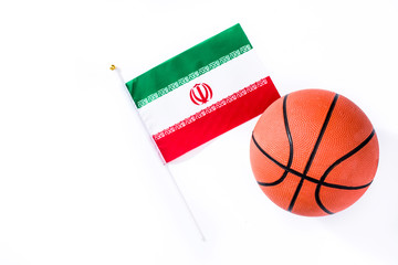Basketball and Iranian flag isolated on white background. Top view. Copyspace