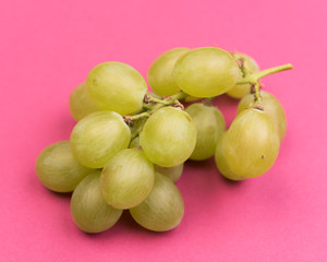 
white grapes on colorful backgrounds