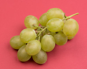 
white grapes on colorful backgrounds