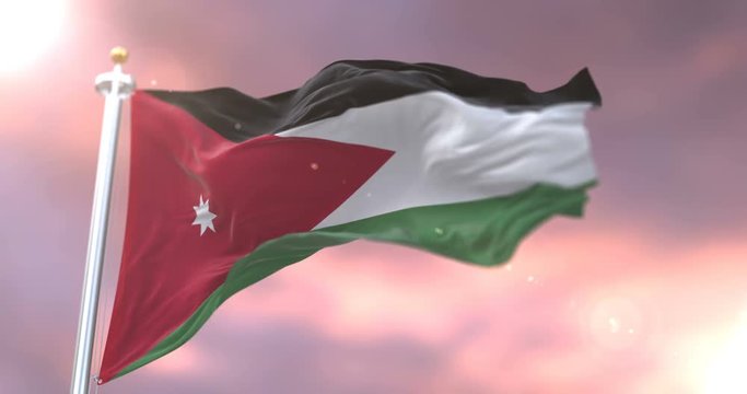 Flag of Jordan waving at wind at sunset in slow, loop