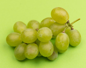
White grapes on colorful backgrounds