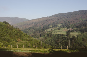 Fototapeta na wymiar Mountain landscape with meadows and hills.