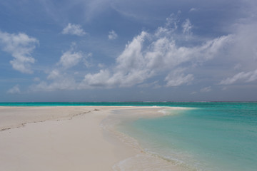 Lonely beach in the Caribbean on a sunny summer day with an almost cloudless sky No. 2