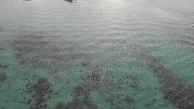 Flying above crystal clear waters of Laem Tong, Part Of Phi Phi Island. D-Cinelike