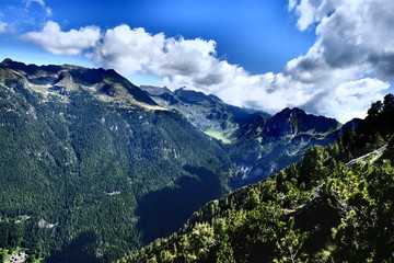 Fototapeta na wymiar Vista aerea delle cime delle alpi orobie in Italia, provincia di Bergamo. Le montagne sono sovrastate da nubi