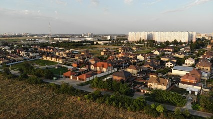 Fototapeta premium Photo in flying away from the houses