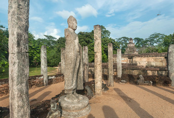 Columns, ruins and 12th century buddhist temple statues, Sri Lanka. Ancient town Polonnaruwa....
