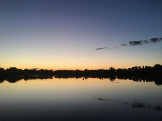 Sunset at a lake with beautiful reflections
