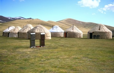 The ger camp in a large meadow at Song kul lake ,  Naryn of Kyrgyzstan