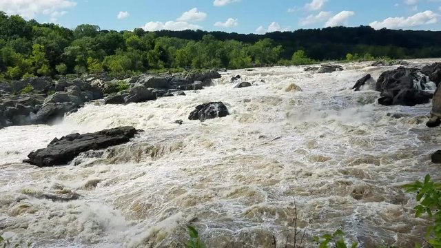 The Potomac river rapids swollen by heavy rains, at the Great Falls, in Maryland, USA
