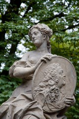 Fototapeta na wymiar Statue in Saxon garden in Warsaw, Europe