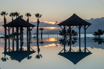 Silhouette refections in pool