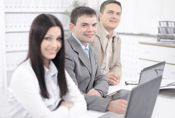 prospective employees sitting on the workplace in the office
