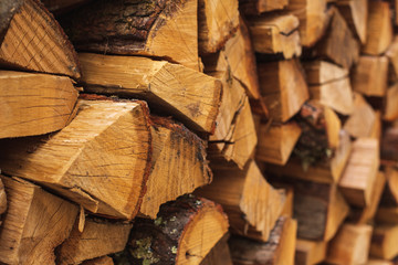 .Stacks of Firewood. Preparation of firewood for the winter..Pile of Firewood.Firewood background