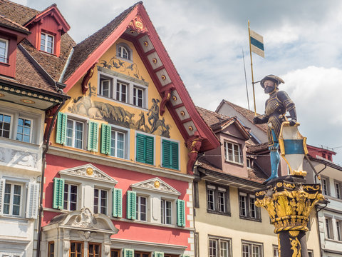 Colourful historic buildings and statue, Zug