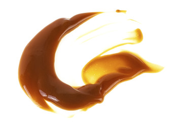 Caramel sauce isolated on white background