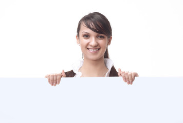 successful young business woman showing blank banner