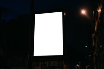 Modern empty billboard with space for text at night