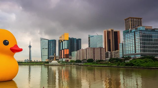 4K Timelapse of Macau city with yellow duck, China