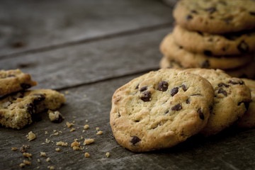 Chocolate cookies on natural wooden table.