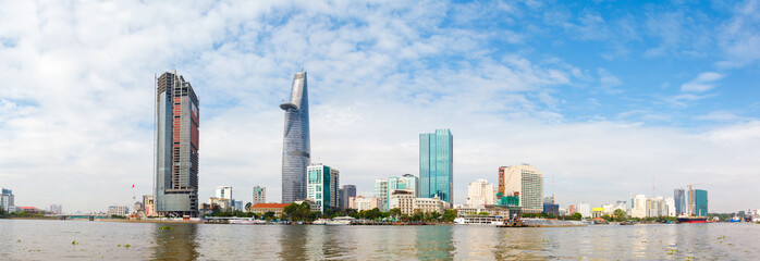 skyscrapers business center in Ho Chi Minh City on Vietnam Saigon on background blue sky. view of...