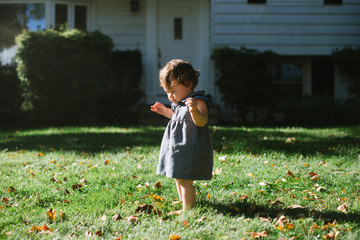 Baby standing up on her own