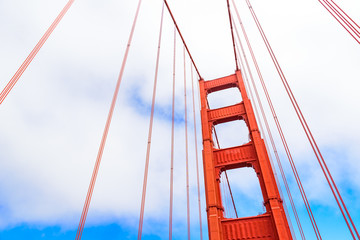 Golden Gate Bridge on a beautiful sunny day with blue sky and clouds in summer - San Fancisco Bay Area,  Golden Gate National Recreation Area, California, USA