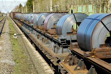 Sheet metal is loaded into railway cars